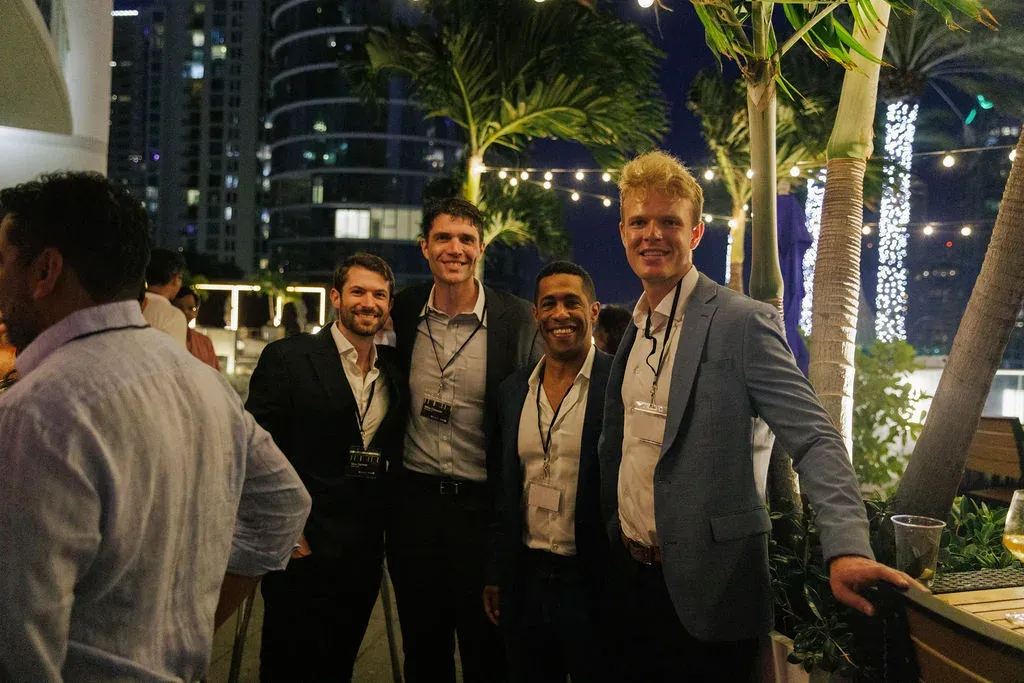 Four members of the Brightwave team posing for a group photo at AI Innovation in Private Capital: A SuperReturn Eve Reception.